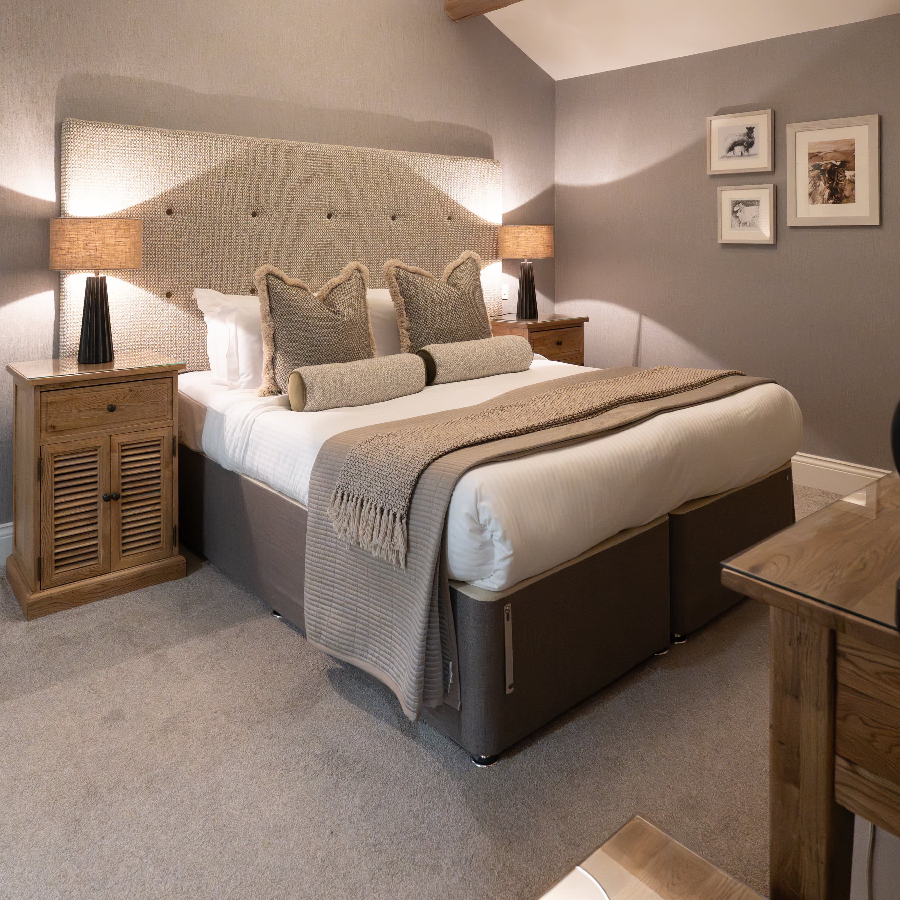 Merrydale Manor Country Bedroom — featuring textured headboard and rustic character