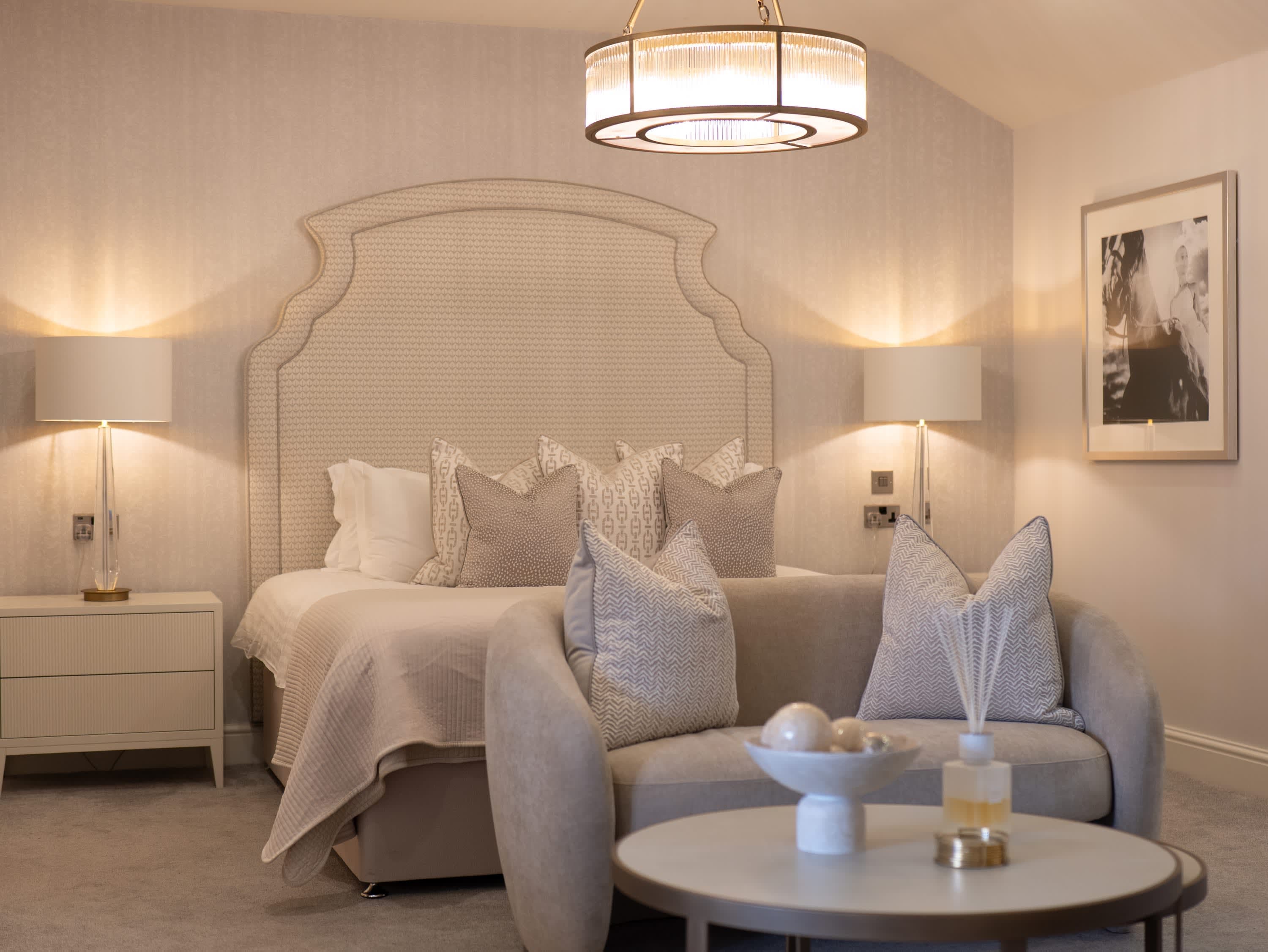 Merrydale Manor Luxury Suite — interior photography showing chandelier and layout