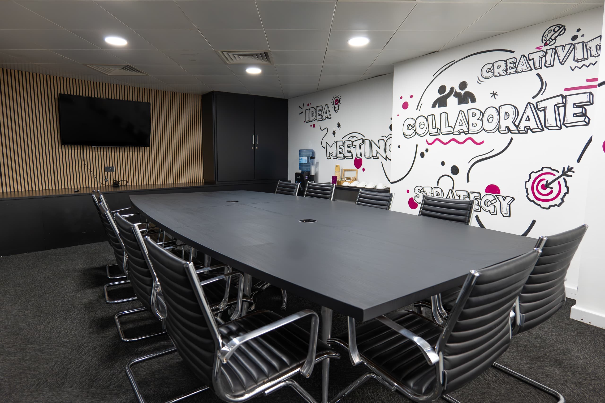 IDEA MEETING COLLABORATE CREATIVITY STRATEGY mural in the Genesis Centre boardroom, Birchwood Warrington