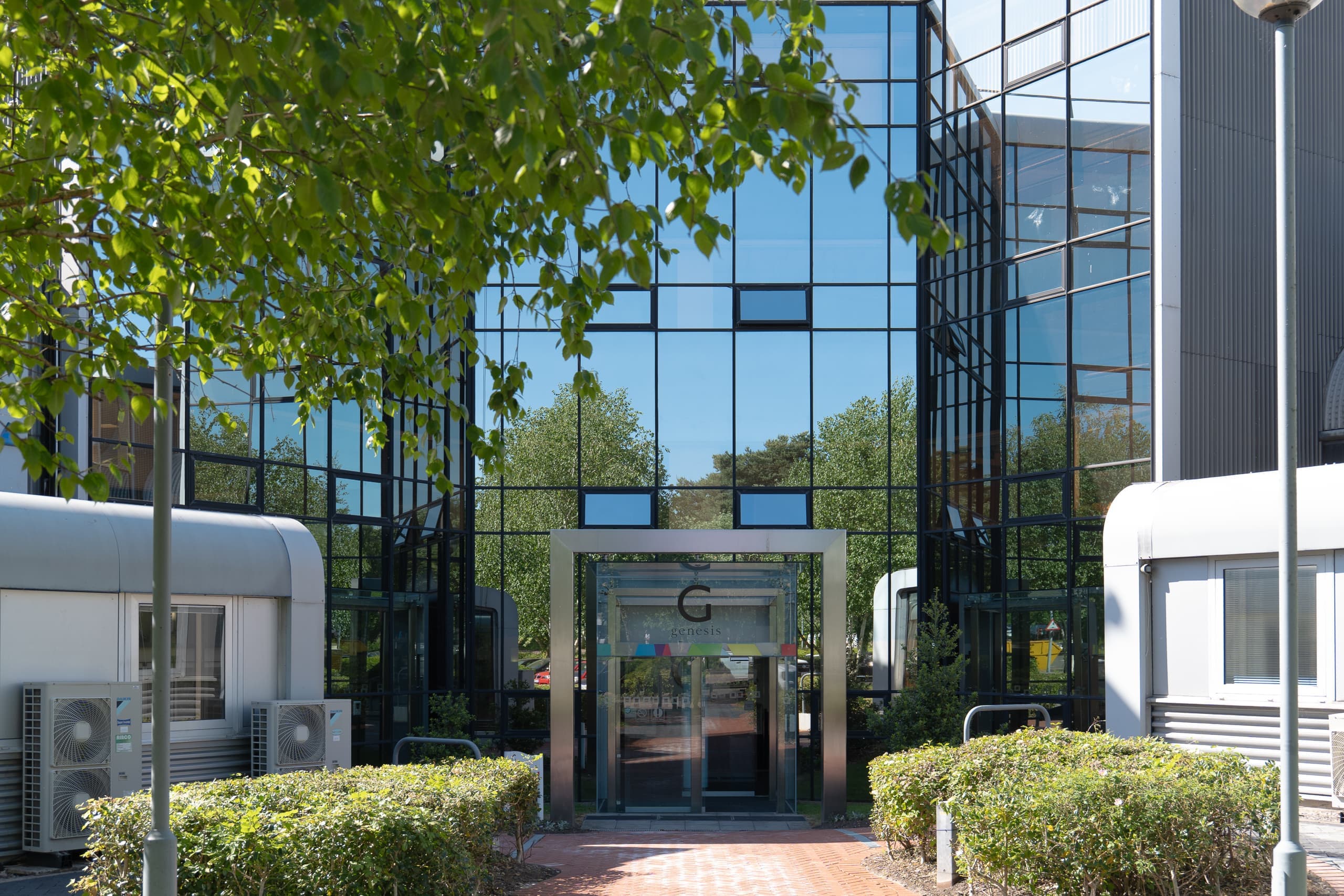 Main exterior entrance of the Genesis Centre office block in Birchwood, Warrington