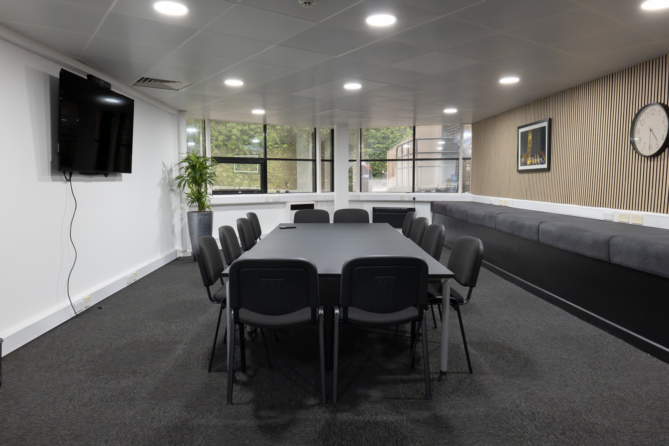 Genesis Centre meeting room featuring premium acoustic timber slat feature wall, Birchwood Warrington