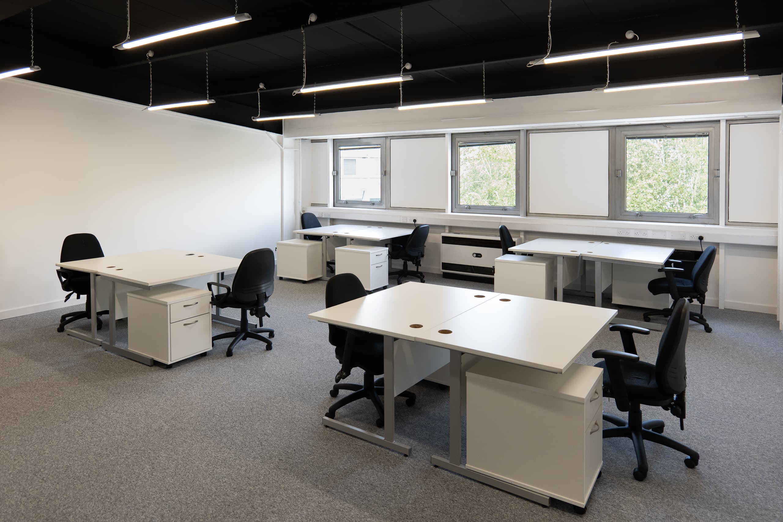 Grade A open-plan office at Genesis Centre — view C showing window line and workstation arrangement, Birchwood Warrington