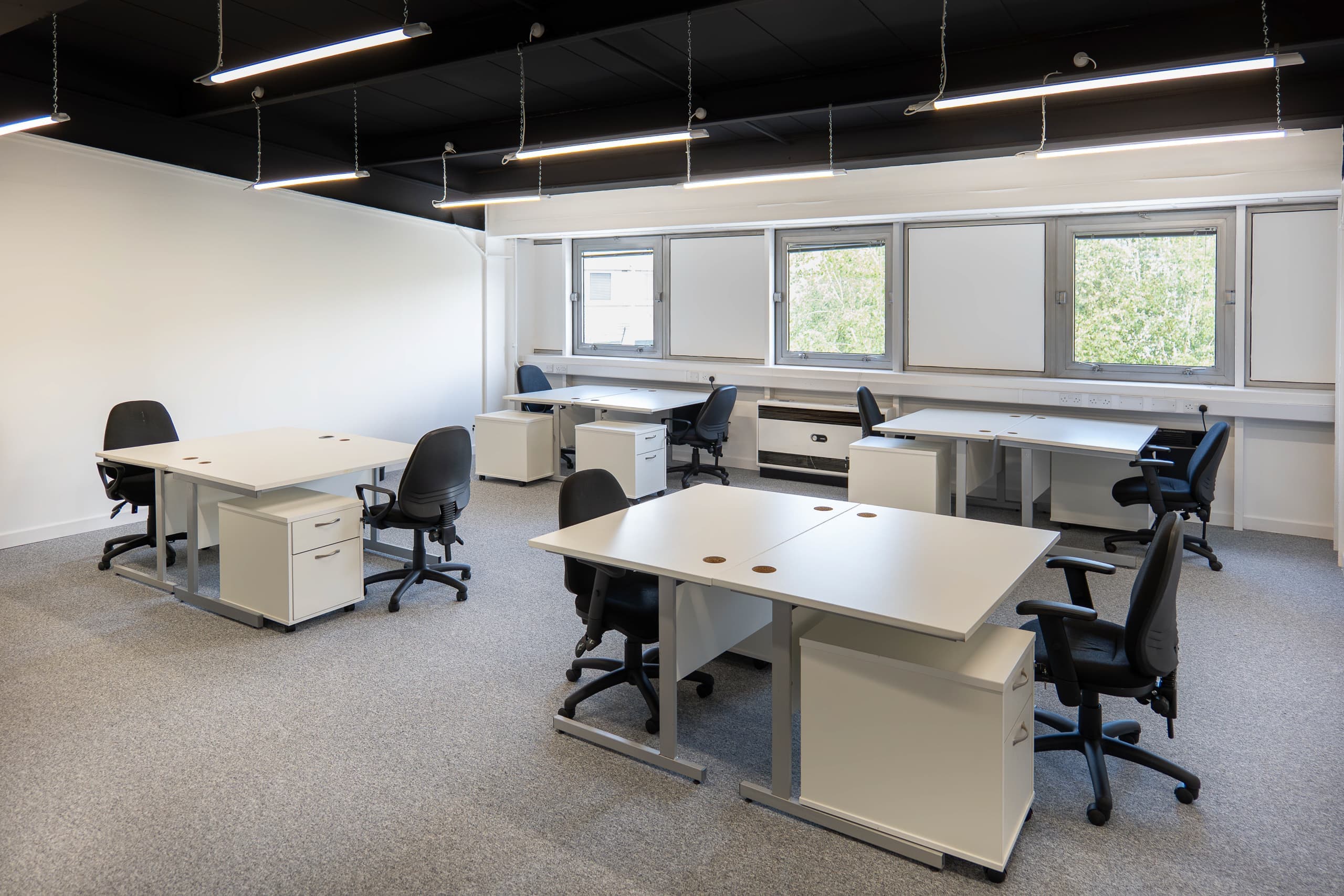 Grade A open-plan office at Genesis Centre — view D corner perspective with exposed ceiling services, Birchwood Warrington