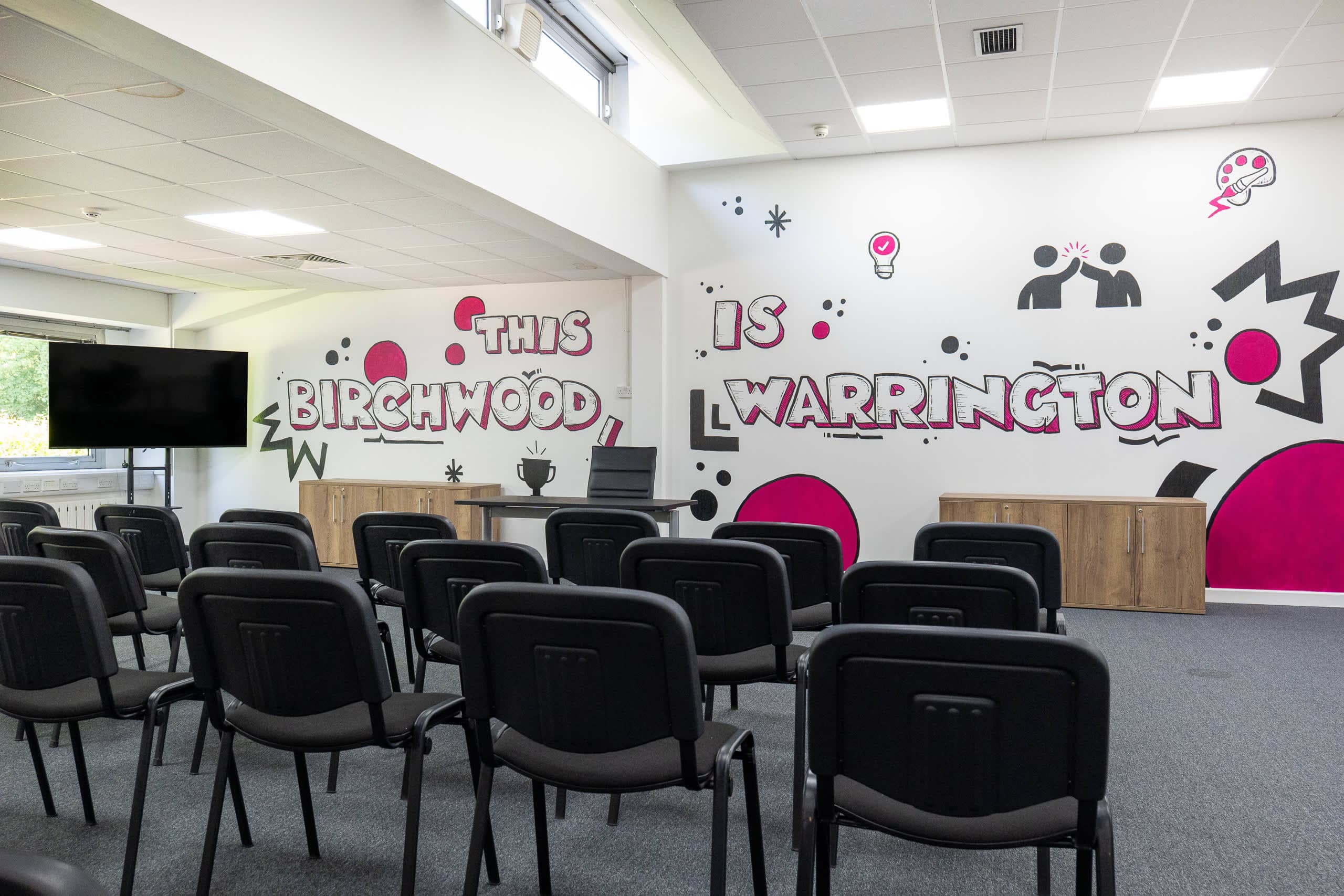 Theatre-style training room at Genesis Centre configured for large-group events, Birchwood Warrington
